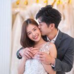beautiful-young-brunette-love-couple-choosing-wedding-dress-in-a-bridal-salon-a-man-stand-hugging.jpg