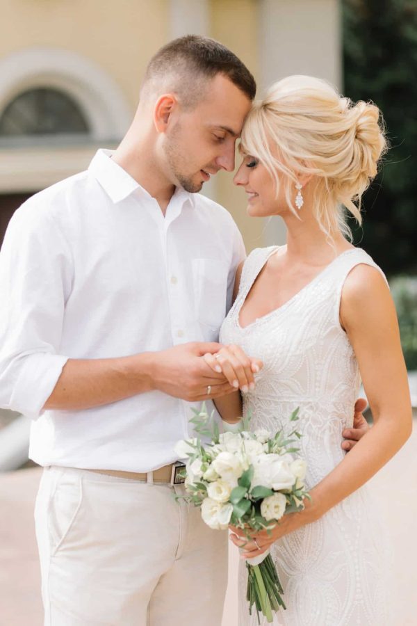 romantic-wedding-couple-embracing-outdoors-on-their-special-day.jpg